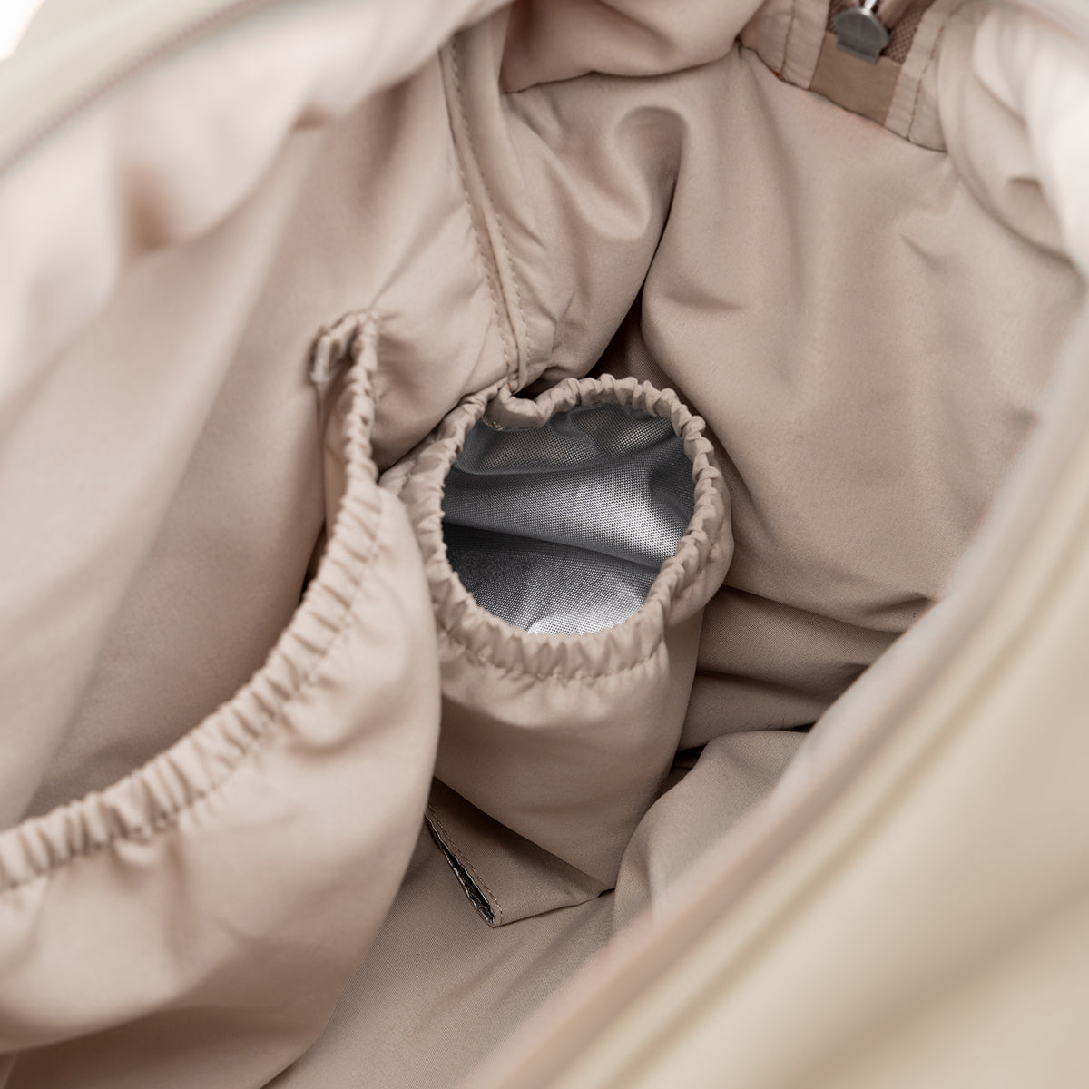 Gesteppte Wickeltasche Sand